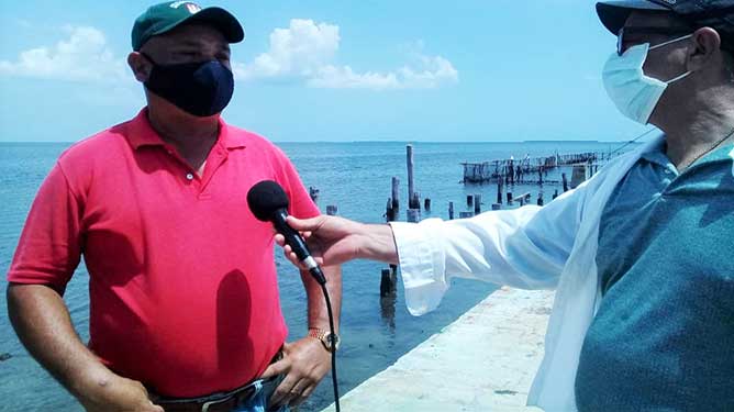 Reinerio Díaz y periodista